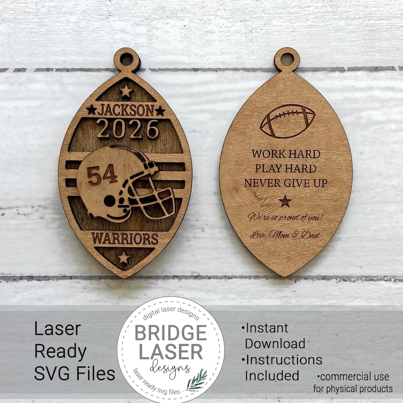 May include: Two football-shaped wooden ornaments with laser-cut designs. The left ornament features the name JACKSON, the year 2026, the number 54, a football helmet, and the word WARRIORS. The right ornament displays a football and the text WORK HARD PLAY HARD NEVER GIVE UP, along with the phrase We're so proud of you! Love, Mom & Dad.