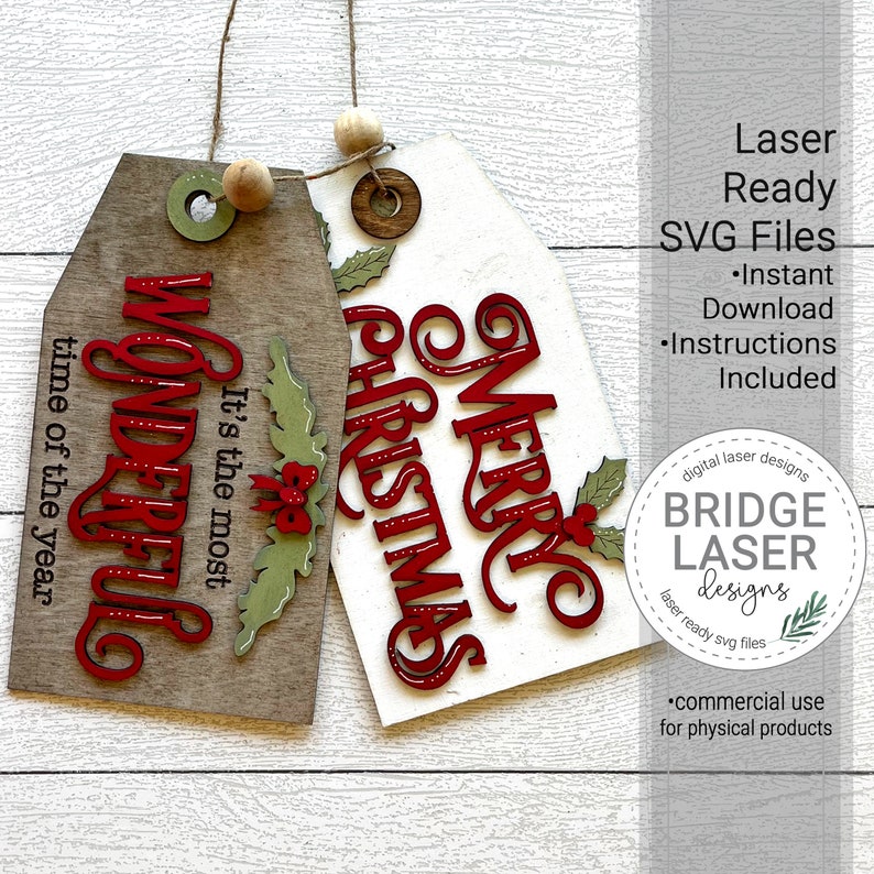 May include: Two wooden gift tags with twine and wooden beads. One tag is brown with red text reading It's the most WONDERFUL time of the year and a green holly sprig. The other is white with red text reading MERRY CHRISTMAS and a green holly sprig.