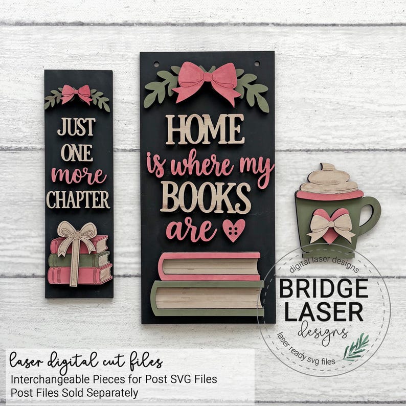 May include: Two rectangular black wooden signs and a mug-shaped cutout. The left sign reads JUST ONE more CHAPTER with a stack of books and a bow. The right sign reads HOME is where my BOOKS are with two books and a bow. A mug with a heart and bow.