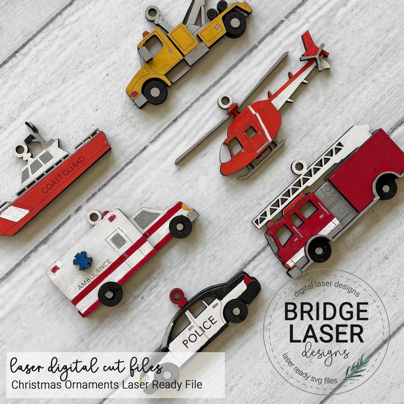 May include: A collection of six wooden emergency vehicle ornaments including a yellow tow truck, a red helicopter, a red and white Coast Guard boat, a white ambulance with a blue star, a red fire truck with a ladder, and a black and white police car.