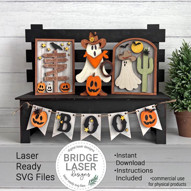 May include: A Halloween-themed wooden tiered tray decor set featuring a sign with directional arrows labeled Boo Town, Spooky Gulch, Ghost Ridge, Witchy Wells, and Haunted Hollow, a ghost wearing a cowboy hat, and a ghost with a cactus.