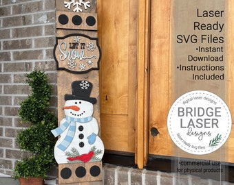 May include: A wooden snowman-themed welcome sign with the words "Let It Snow". The sign features a snowman with a black hat, blue scarf, and a red cardinal. The sign is approximately 48 inches tall and includes decorative snowflakes and black circles.