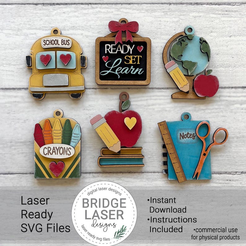 May include: Six school-themed wooden ornaments featuring a yellow school bus, a chalkboard with the text READY SET LEARN, a globe with a pencil and apple, a box of crayons, a red apple with a pencil and books, and a blue notebook with a ruler and scissors.