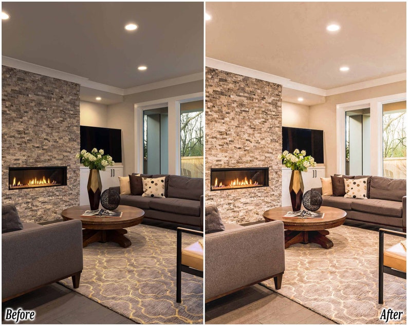 May include: A living room with a stone fireplace, a gray couch, a coffee table, and a rug. The room is lit by recessed lighting.