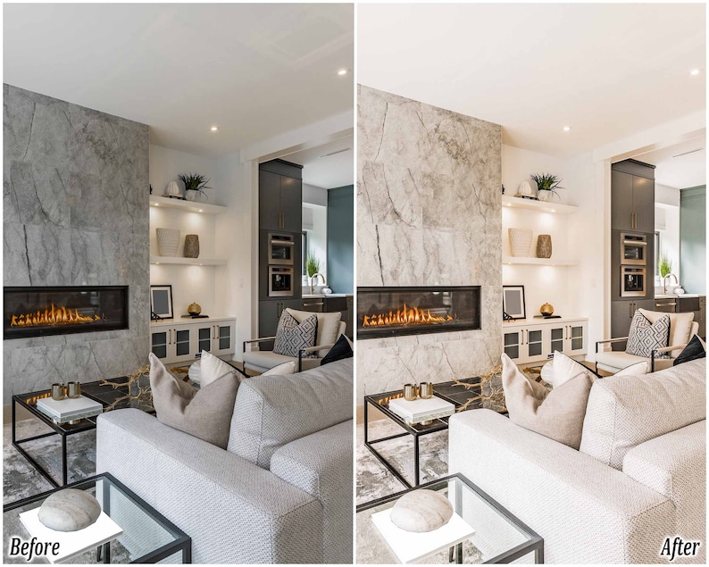 May include: A modern living room with a fireplace, a large white couch, and a gray stone wall. The fireplace has a glass front and a fire burning inside. The couch has a few pillows on it and is facing the fireplace. There is a coffee table in front of the couch.