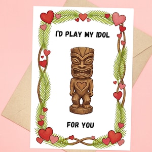 May include: Greeting card with a brown tiki idol illustration, surrounded by red and pink hearts and green leaves. The text reads "I'd play my idol for you."