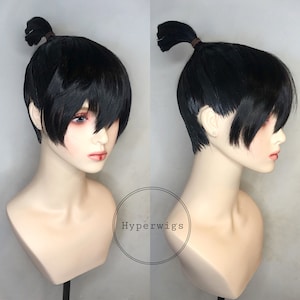 May include: Black wig with a short, straight style and a ponytail on top. The wig is styled on a mannequin head. The text "Hyperwigs" is visible in the image.