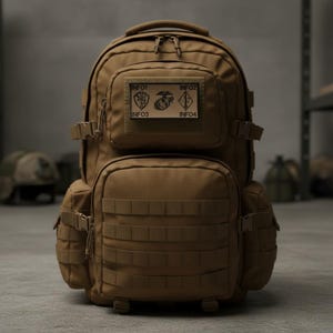May include: A tan tactical backpack featuring multiple zippered compartments, side compression straps, and a front MOLLE webbing system. A rectangular patch is centered on the upper pocket, displaying the text INFO1, INFO2, INFO3, and INFO4.