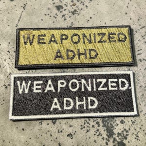 May include: A set of three ceramic mugs with a speckled, matte finish. The mugs are in shades of cream, light gray, and dark gray. Each mug has a simple, minimalist design, perfect for coffee or tea.