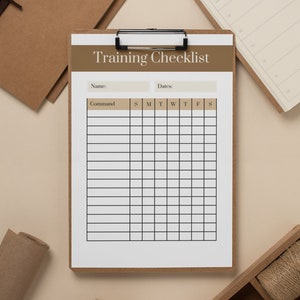 May include: A printable training checklist with a brown header and black text. The checklist includes fields for name, date, command, and days of the week. The checklist is on a clipboard with a brown background.