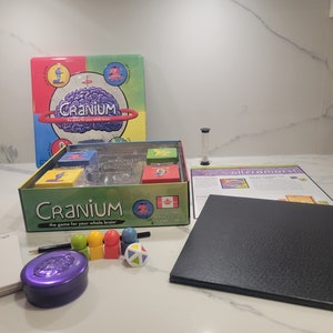 Vintage Cranium Board Game in a tin,  Great Condition, All pieces included