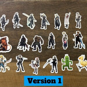 May include: A collection of twenty Final Fantasy character stickers, each with a white border. The stickers feature various characters in action poses, with a variety of colors and designs. The text "Version 1" is in a blue rectangle.
