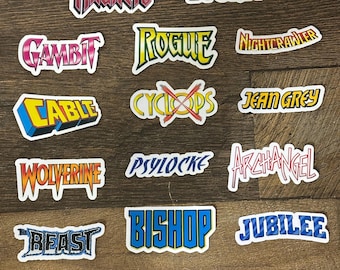 May include: A collection of thirteen die-cut stickers featuring the names of comic book characters including Magneto, Storm, Gambit, Rogue, Nightcrawler, Cable, Cyclops, Jean Grey, Wolverine, Psylocke, Archangel, Beast, Bishop, and Jubilee.
