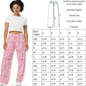 Peut inclure: Pantalon de pyjama rose et blanc &agrave; carreaux avec un motif r&eacute;p&eacute;titif d'axolotls de dessin anim&eacute;. Le pantalon a une taille &eacute;lastique et une jambe large. Mesures en cm.
