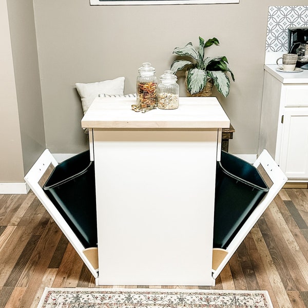 Kitchen Island and tilt-out trash cabinet in white