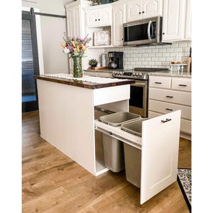 Kitchen Island and tilt-out trash cabinet