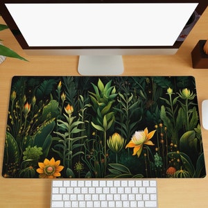 May include: A dark green and black floral mousepad with yellow flowers and green leaves. The mousepad is designed to look like a botanical illustration.
