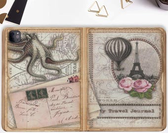 May include: A vintage-style travel journal with a brown leather cover and a gold-colored metal clasp. The cover features a collage of images, including an octopus, a hot air balloon, and the Eiffel Tower. The text "My Travel Journal" is printed on the cover.