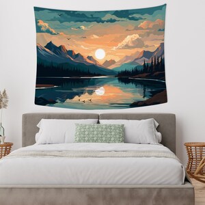 May include: A tapestry featuring a scenic landscape with a lake reflecting a sunset over mountains. The sky is a mix of blue, orange, and pink with fluffy clouds. The lake is a deep blue with a reflection of the sunset. The mountains are a dark blue and green.