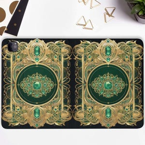 May include: A black phone case with a gold and green design. The design features intricate patterns and a large emerald gemstone in the center.