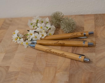 Personalized sustainable wooden ballpoint pen with custom engraving - promotional item