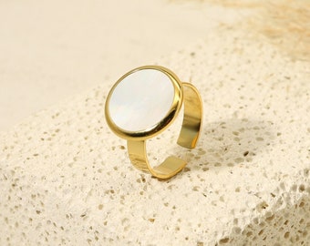 Round mother-of-pearl ring in stainless steel