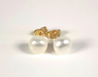 Parels met certificaat voor deze 8 mm gekweekte pareloorbellen op vergulde studs.