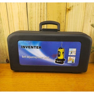 May include: A black carry case with a handle, displaying a blue and white label that reads "INVENTEK Self Adjusting Laser Level." Inside is a yellow and black laser level tool, with diagrams showing its application.