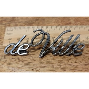 deVille Script Fender Emblem 6965825