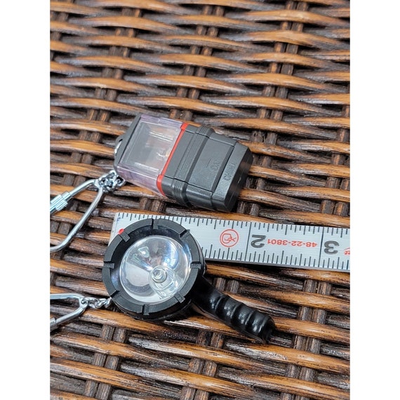 Vintage Coleman and Spotlight Key Chains Gem