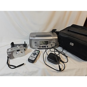 HP Photosmart 145 Compact Photo Printer, 886 Digital Camera Dock, HP 735 Digital Camera, Remote Control and Charging Cord