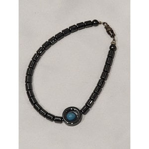 Hematite Barrel Beaded Bracelet with Single Turquoise Stone