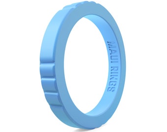 May include: A light blue silicone ring with the text "MAUI RINGS" engraved on the side.