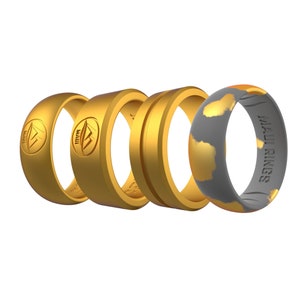 May include: Four silicone rings in gold and gray. Three rings are solid gold with a mountain logo. One ring is gray with a gold speckled pattern and the text "MAUI RINGS" on the side.