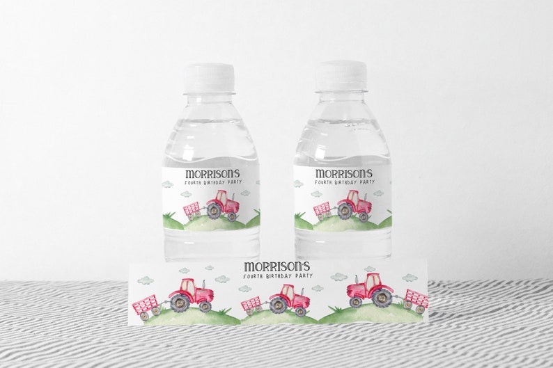 May include: Water bottle labels with a red tractor design. The labels say "Morrisons Fourth Birthday Party".