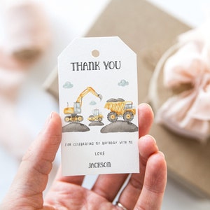 May include: Thank you tag with a watercolor illustration of construction vehicles. The text reads "Thank you" and "For celebrating my birthday with me. Love, Jackson."