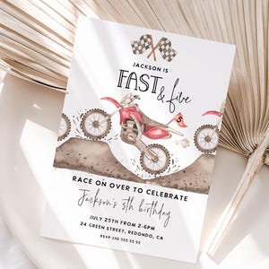 May include: A birthday party invitation with a watercolor illustration of a red dirt bike. The text reads "Jackson is Fast & Five" and includes details for the party, including the date, time, and location.