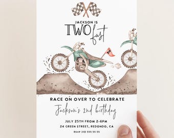 May include: A birthday party invitation with a green and black dirt bike jumping over a dirt mound. The invitation says "Jackson is Two Fast" and includes details for the party, including the date, time, and location.