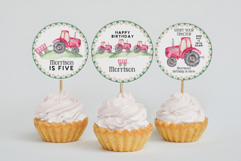 May include: Three round cupcake toppers with a red tractor theme. The toppers feature a red tractor with a green wagon, a line of red tractors, and a single red tractor with the text "Start your tractor and put it into gear!" The toppers are decorated with green and pink floral borders.