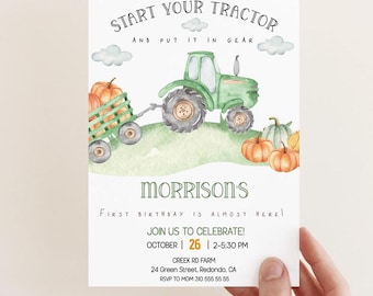 May include: A green tractor pulling a wagon full of pumpkins. The tractor has a black tyre and a green cab. The wagon is brown with a white rim. The background is a watercolour painting of a green field with clouds. The text on the invitation reads "Start your tractor and put it in gear. Morrison's First Birthday is almost here! Join us to celebrate! October 26 | 2-5:30 PM Creek Rd Farm 24 Green Street, Redondo, CA RSVP to Mom 310 555 55 55".