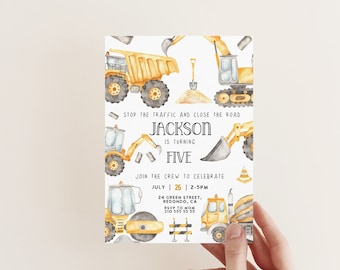 May include: Construction vehicle themed birthday party invitation with yellow and gray watercolor illustrations of construction vehicles, a shovel, and traffic cones. The text reads "Stop the traffic and close the road Jackson is turning five. Join the crew to celebrate July 26 2-5pm 24 Green Street, Redondo, CA RSVP to Mom 310 555 55 55"