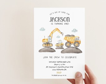 May include: A yellow construction vehicle birthday party invitation with a watercolor illustration of an excavator, dump truck, and roller. The invitation says "Let's dig up some fun, Jackson is turning one!" and includes details for the party, including the date, time, and location.