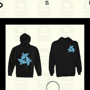 Könnte beinhalten: Schwarzer Hoodie mit einem blauen Fischdesign auf Vorder- und Rückseite. Ein passender schwarzer Hoodie mit einem blauen Fischdesign auf der Brust. Ein silberner Schlüsselanhänger mit einem blauen Fischdesign.