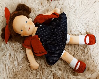 This beautiful 16 inch tall doll can't wait to come to your home.  Your children will love this New Year's gift