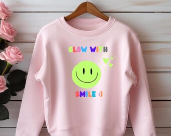 GlowWithSmile, Camiseta Sonrisa, Camiseta Positiva, Camiseta Sé Feliz, camiseta sonrisa para niñas, camiseta sonrisa linda, camiseta vibra feliz, camiseta chica moderna, camiseta infantil