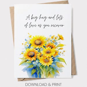 A greeting card with a watercolor illustration of a bouquet of yellow sunflowers and blue flowers. The card has a message that reads "A big hug and lots of love as you recover" and is accompanied by the text "DOWNLOAD & PRINT".