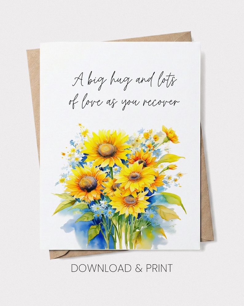 A greeting card with a watercolor illustration of a bouquet of yellow sunflowers and blue flowers. The card has a message that reads "A big hug and lots of love as you recover" and is accompanied by the text "DOWNLOAD & PRINT".