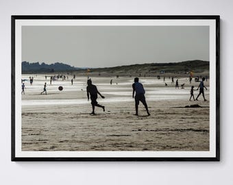 Football on the beach, sunset summer silhouette scene of sports in the sand art print