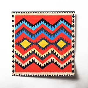 Könnte beinhalten: Ein roter, blauer, gelber und schwarzer Stoff mit geometrischem Muster und einem schwarzen und weißen Rand.