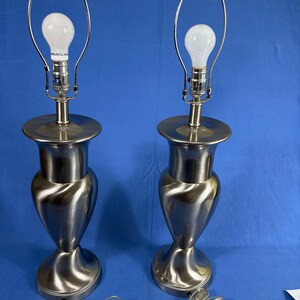 Transitional-style brushed metal table lamps